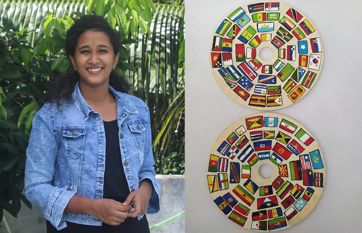 YOUNGEST TO PAINT ALL NATIONAL FLAGS ON  TWO CDS
