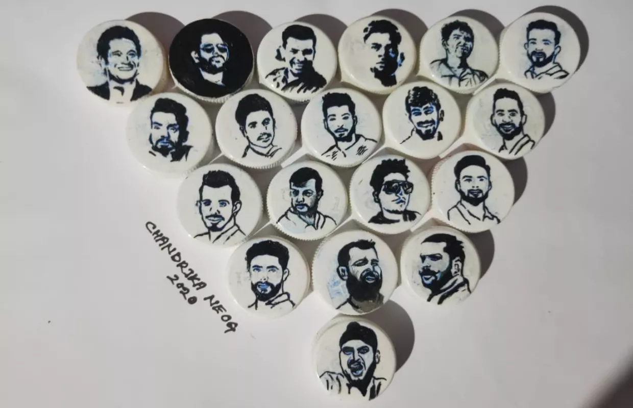 MAXIMUM FACES OF INDIAN CRICKET TEAM PLAYERS PAINTED ON BOTTLE CAPS
