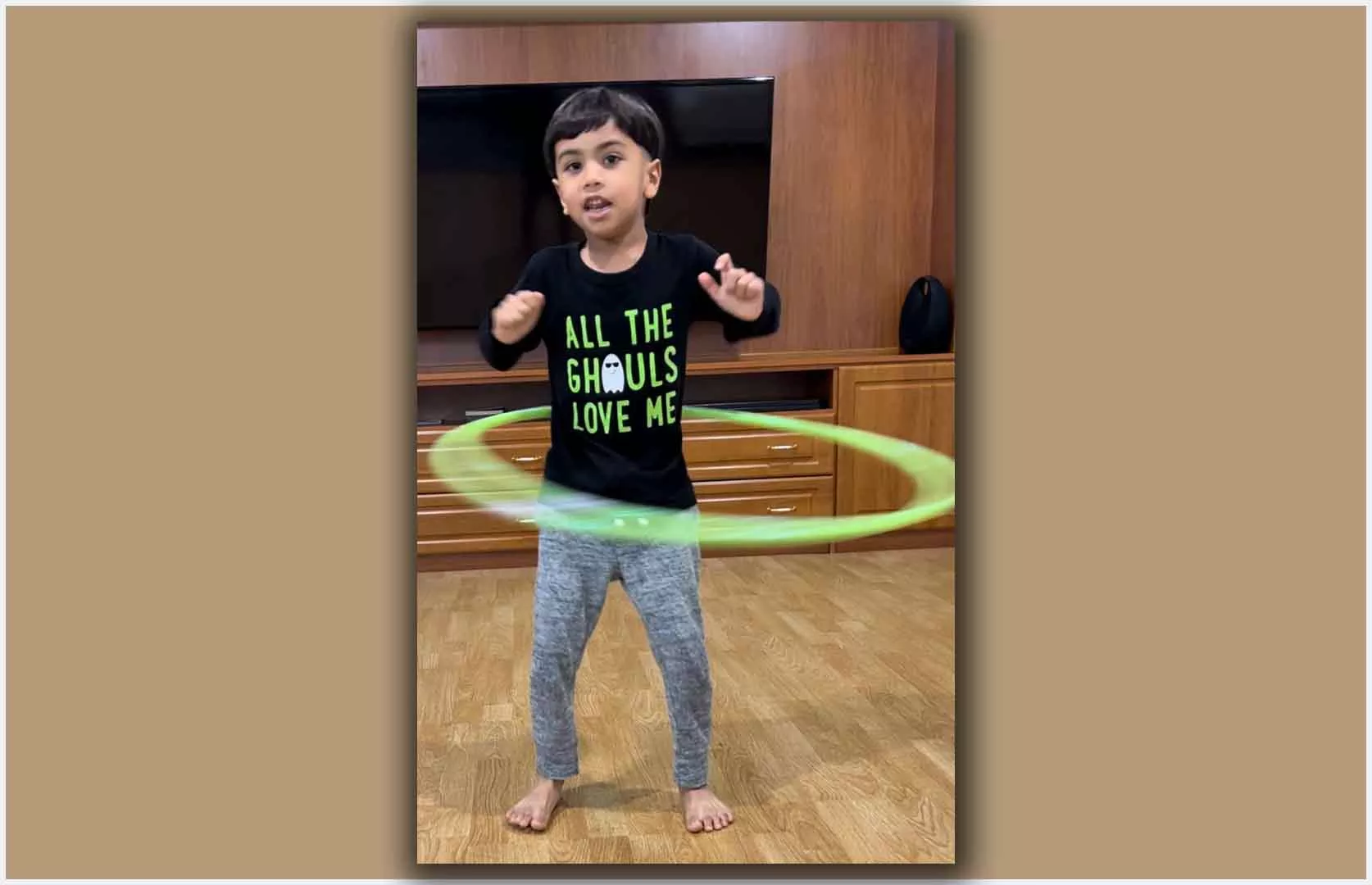 LONGEST TIME TO SPIN HULA HOOP AROUND WAIST BY A KID