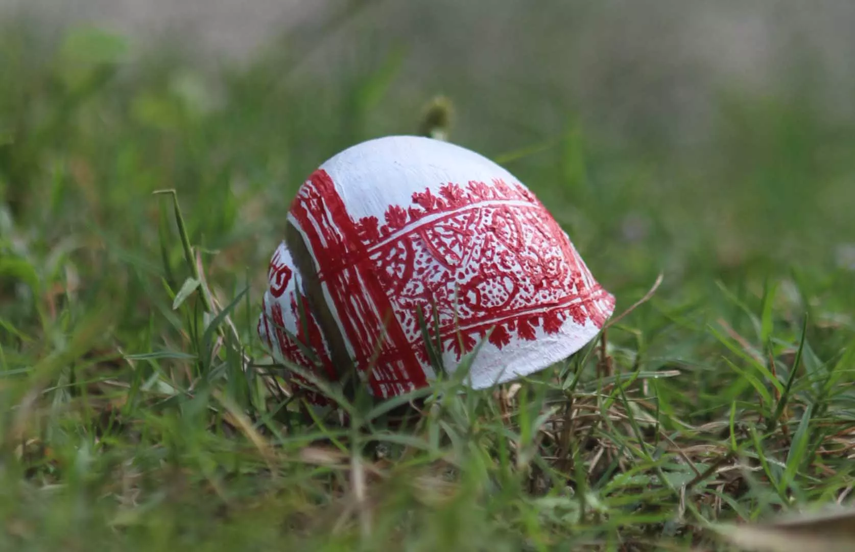 YOUNGEST TO PAINT ASSAMESE PHULAM GAMOSA ON A SMALLEST SNAIL SHELL