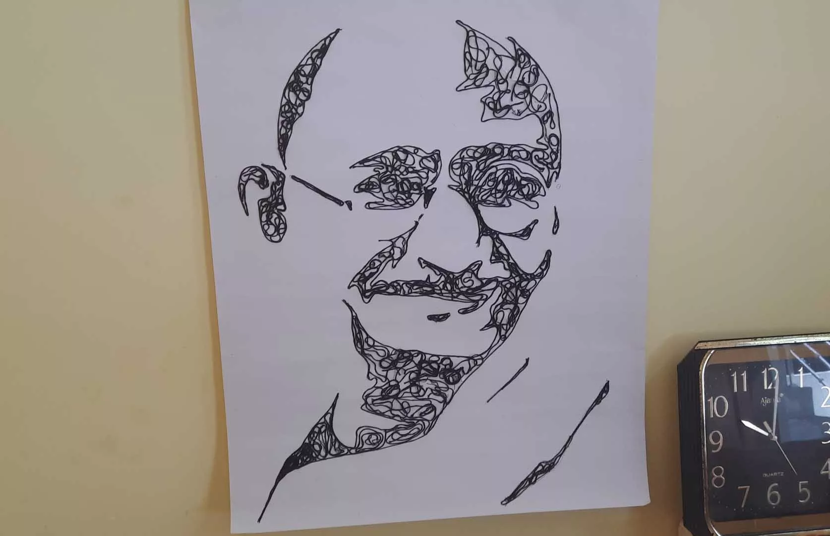 LARGEST PORTRAIT OF MAHATMA GANDHI MADE ON CHART PAPERS USING EMBROIDERY THREADS